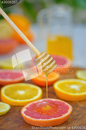 Image of Grapefruit, clementine, orange and honey