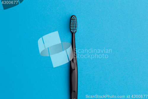 Image of Black toothbrush , place for words