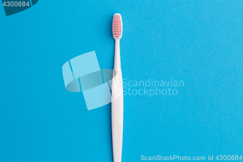 Image of Image of one pink toothbrush