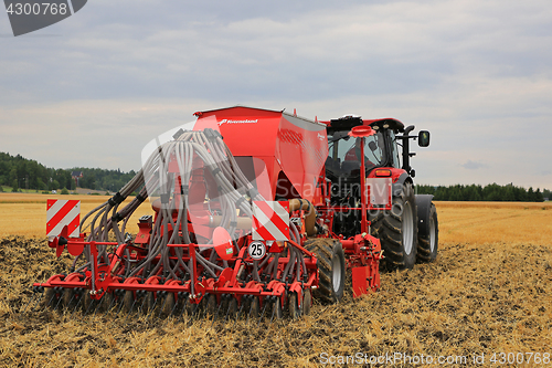 Image of Case IH Tractor and Kverneland U-Drill Seed Drill on Field