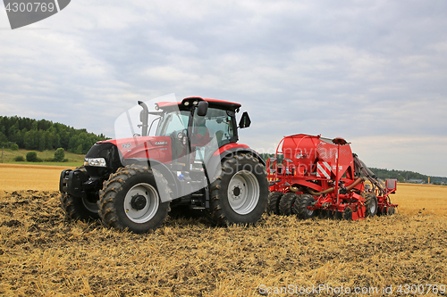 Image of Case IH Maxxum and Kverneland U-Drill Plus on Field