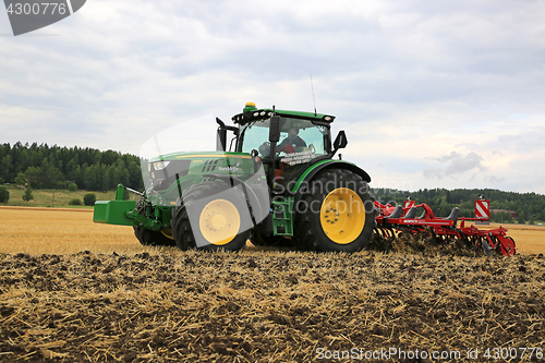 Image of John Deere Tractor and Horsch Cultivator on Stubble Field