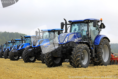 Image of Row of New Holland Tractors