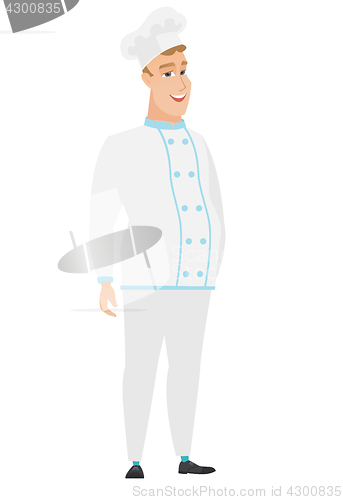 Image of Young caucasian happy chef cook.