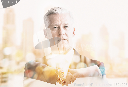 Image of Double exposure of senior businessman