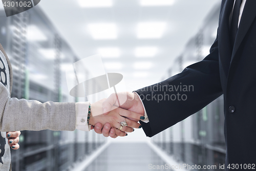 Image of business man and woman handshake on  meeting