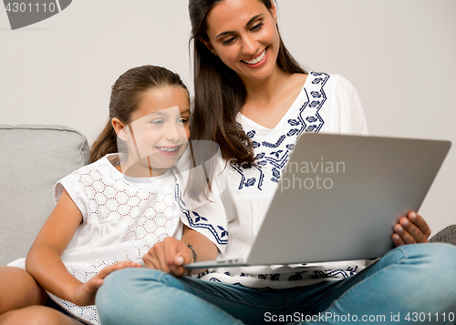 Image of Mother and Daughter at home