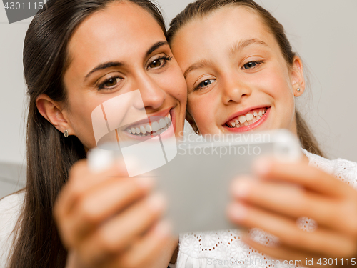 Image of Mom and Daughter at home