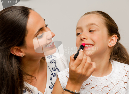 Image of Mother and Daughter playing 