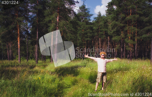 Image of Man Raised Arms in Summer Forest