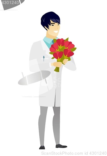 Image of Asian doctor holding a bouquet of flowers