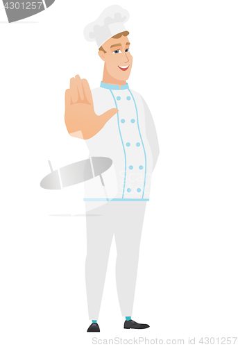 Image of Caucasian chef cook showing palm hand.