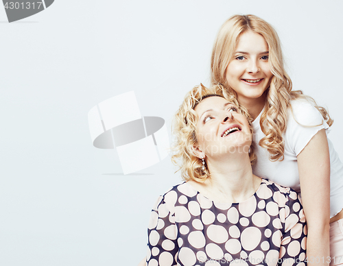Image of mother with daughter together posing happy smiling isolated on white background with copyspace, lifestyle people concept 
