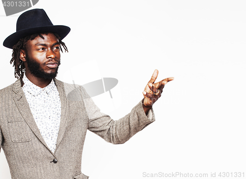 Image of young handsome afro american boy in stylish hipster hat gesturing emotional isolated on white background smiling, lifestyle people concept