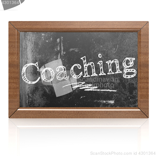 Image of Coaching text written on blackboard