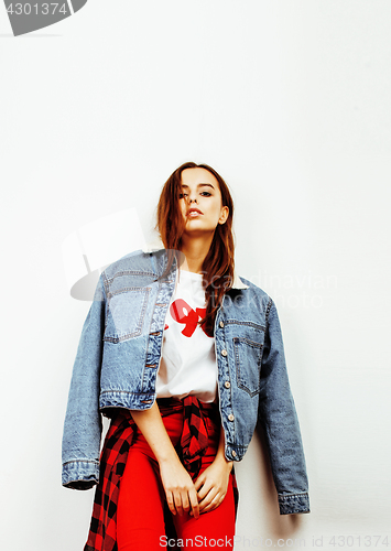 Image of young pretty teenage hipster girl posing emotional happy smiling on white background, lifestyle people concept 