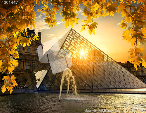 Image of Pyramid of Louvre in autumn