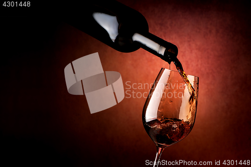 Image of Wineglass on a brown background