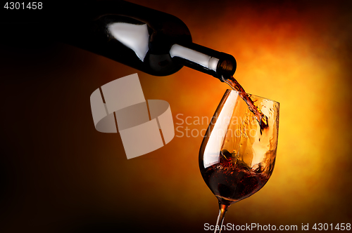 Image of Wineglass on orange background