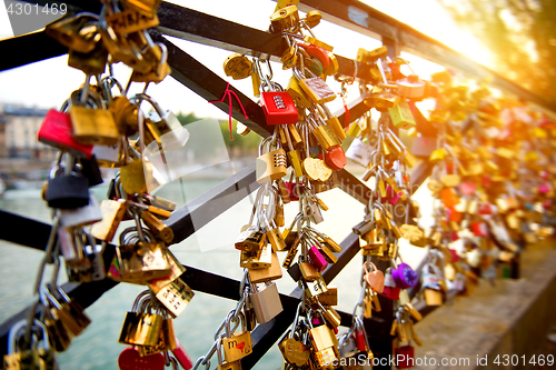 Image of Locks of love on bridge in Paris