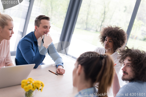 Image of Multiethnic startup business team on meeting