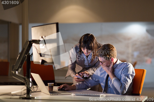 Image of young designers in the night office
