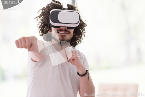 Image of man using VR-headset glasses of virtual reality