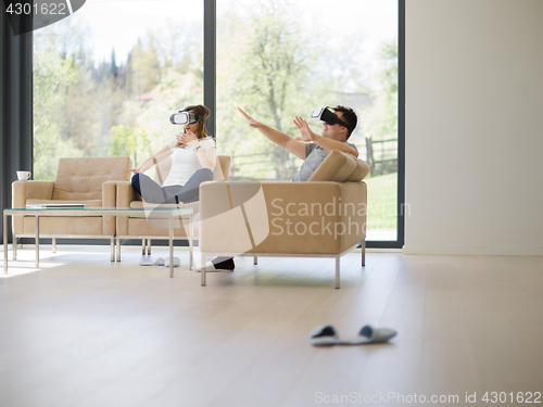 Image of Couple using virtual reality headset