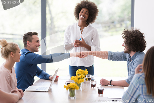 Image of Multiethnic startup business team on meeting