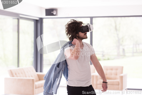 Image of man using VR-headset glasses of virtual reality