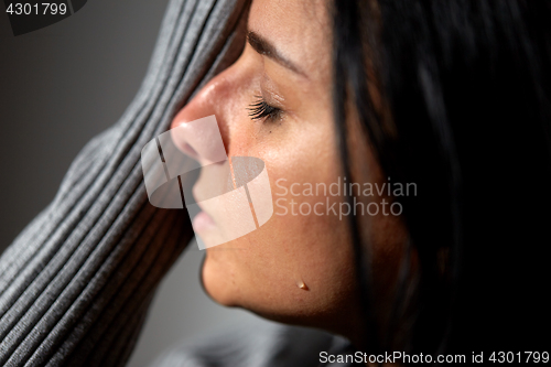 Image of close up of unhappy crying woman