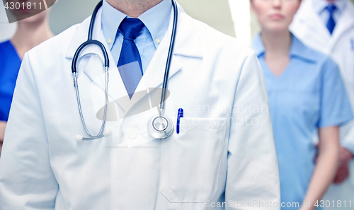 Image of close up of medics or doctors at hospital