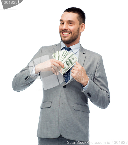 Image of smiling businessman with american dollar money