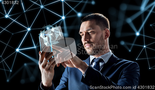 Image of businessman with transparent smartphone