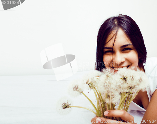 Image of young happy smiling mulatto latin american teenage girl emotional posing on white background, lifestyle people concept