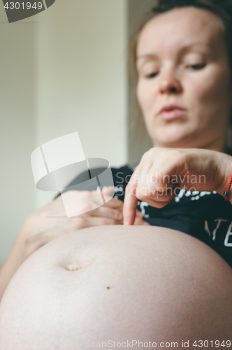 Image of Belly of pregnant woman, nine month