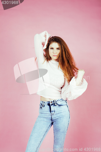 Image of cute pretty redhair teenage girl smiling cheerful on pink background, lifestyle modern people concept