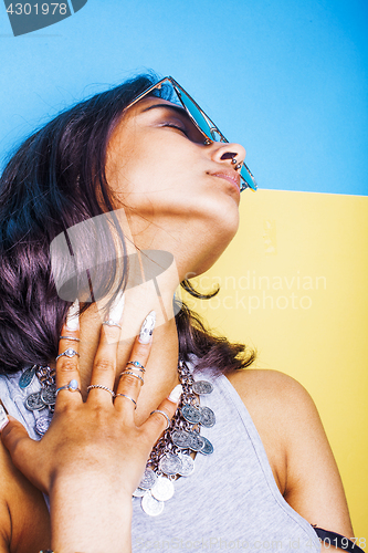 Image of lifestyle people concept. young pretty smiling indian girl with long nails wearing lot of jewelry rings, asian summer happy cool