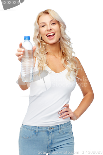 Image of happy beautiful young woman with bottle of water