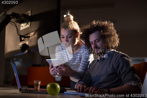 Image of young designers in the night office