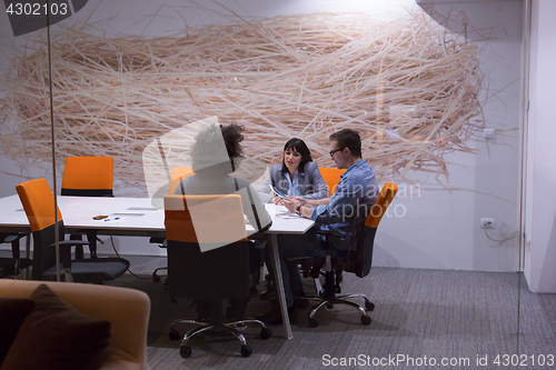 Image of Business Team At A Meeting at modern office building