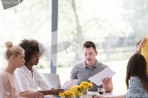 Image of Multiethnic startup business team on meeting