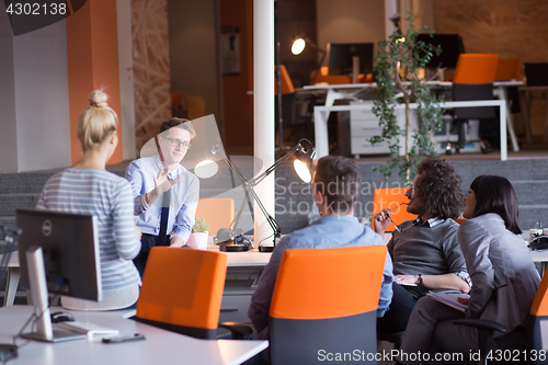 Image of Young Business Team At A Meeting at modern office building