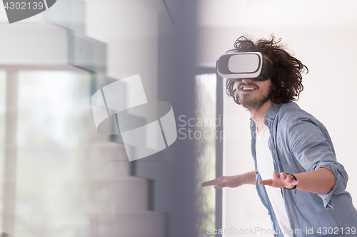 Image of man using VR-headset glasses of virtual reality