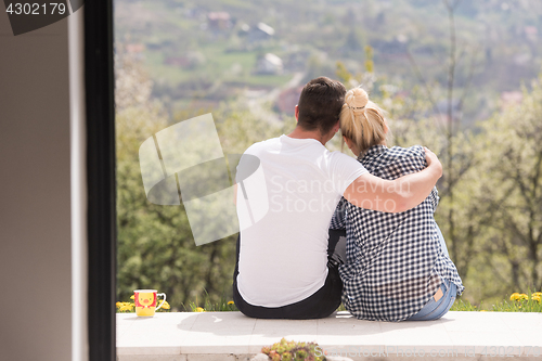 Image of couple enjoying morning coffee