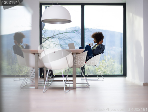 Image of African American woman in the living room