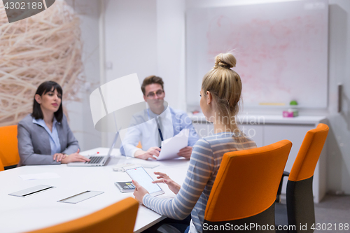 Image of Business Team At A Meeting at modern office building