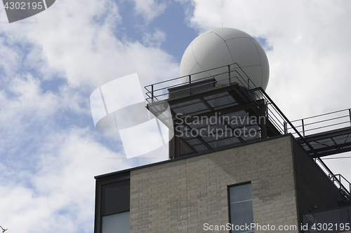 Image of meteorological station on a background of a cloudy sky