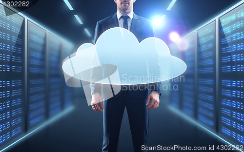 Image of businessman in suit with virtual cloud hologram