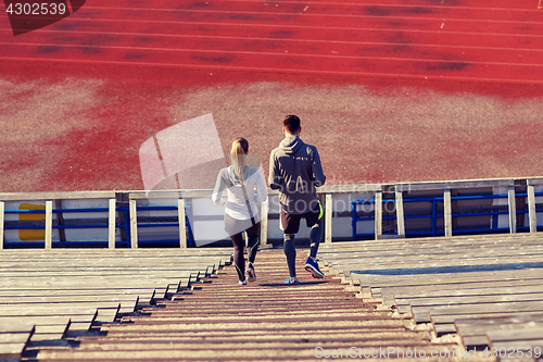 Image of couple walking downstairs on stadium